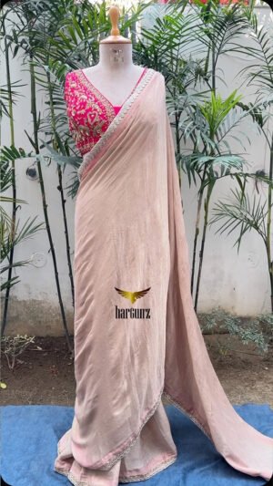 Nude Crushed Silk Saree with a Heavy Contrast Pink Blouse